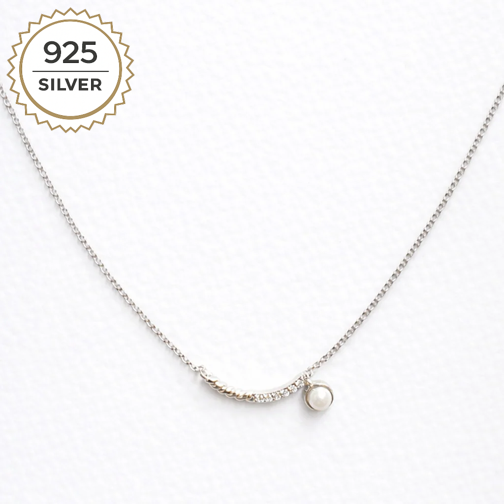 Badged - SERENE ARC NECKLACE