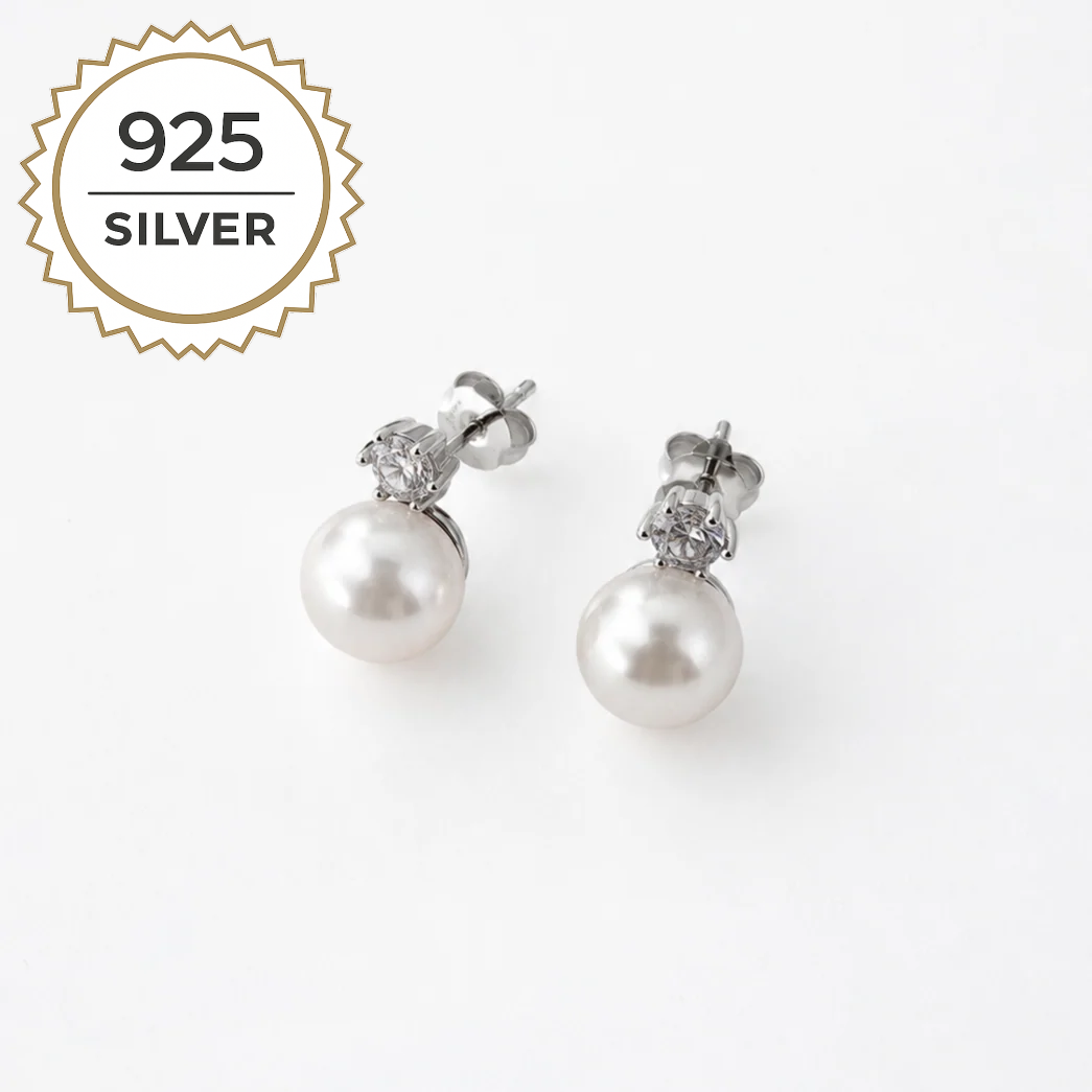Badged - CELINE PEARL STUDS